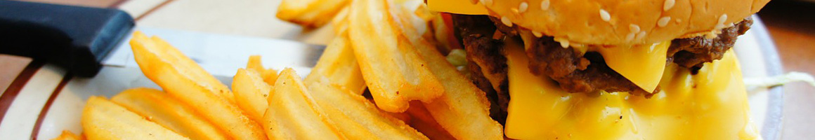 Eating American (Traditional) Burger at Maynard's Cafe restaurant in Margate City, NJ.
